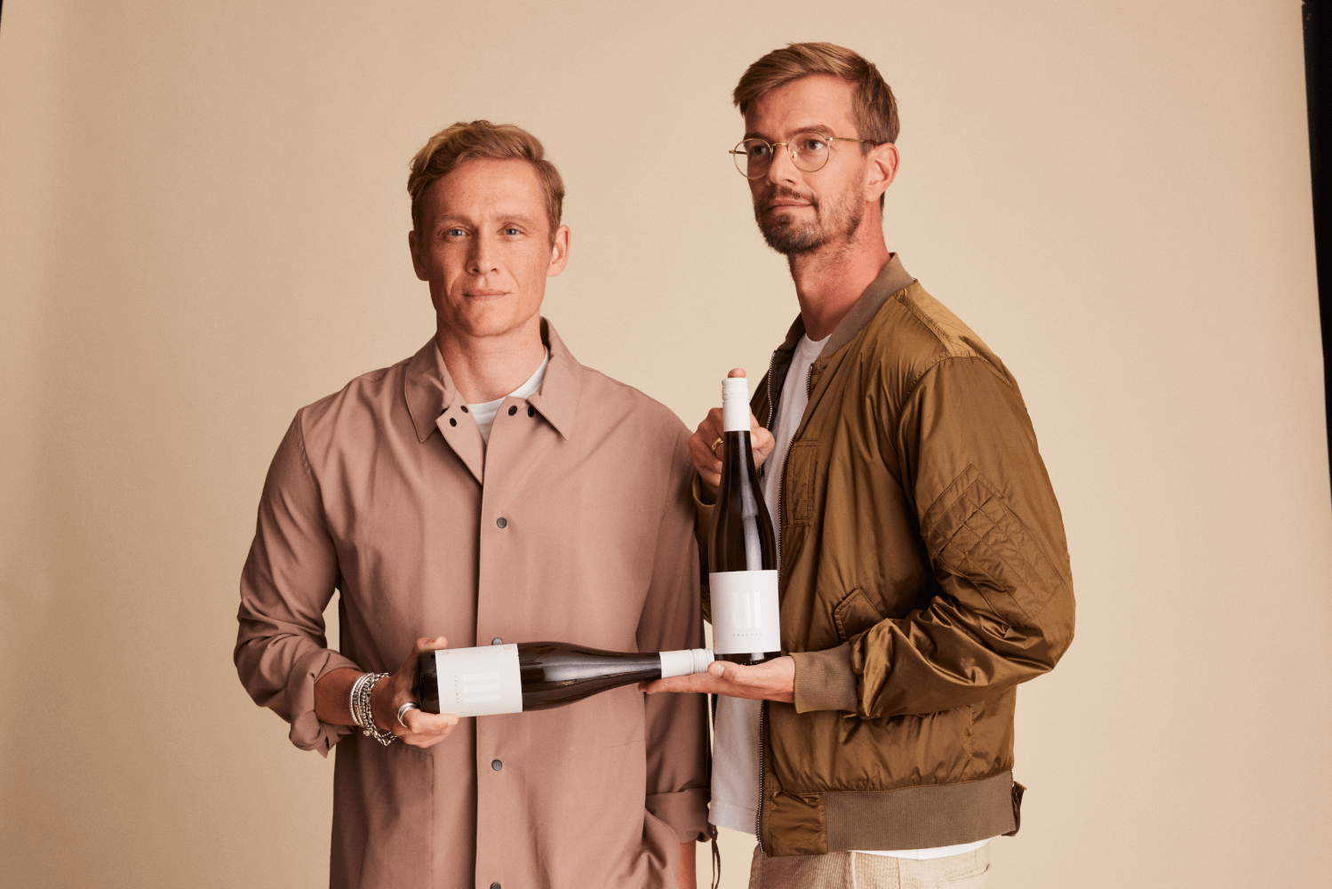 Stolt af deres produkt Tre Venner Vin